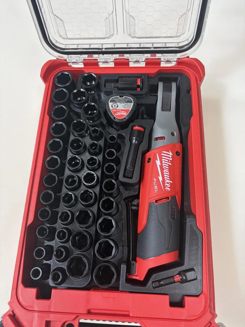 Milwaukee M12 FUELs 3/8 in. HIGH SPEED Ratchet (CAT.NO.2567-20) and Milwaukee SHOCKWAVE 3/8 in. Drive SAE and Metric 6 Point Impact Socket Set (43-Piece) (CAT.NO.49-66-7009).